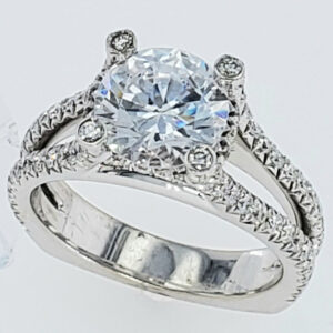 14K white gold split shank 4 prong round brilliant diamond center stone with 2 - rows U style set round diamonds