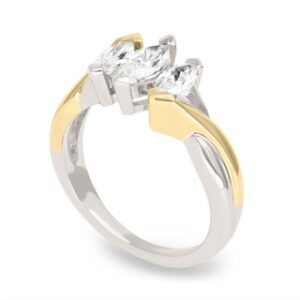 18k two-tone yellow and white gold, 3-stone Marquis cut diamond.
