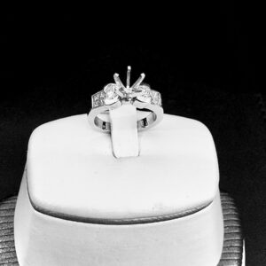18K white gold bazel set round brilliant diamonds & invisible set princess cut diamond engagement ring