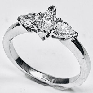 Platinum 3 stone ring Marquise center and 2 pear shaped side stones engagement ring