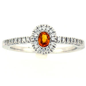 14K white gold oval cut Capushon cut yellow sapphire and round brilliant cut diamond side stones ring
