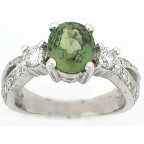 14k White gold ring with Oval Green Sapphire Center Stone and a Diamond pavée Split Shank Ring